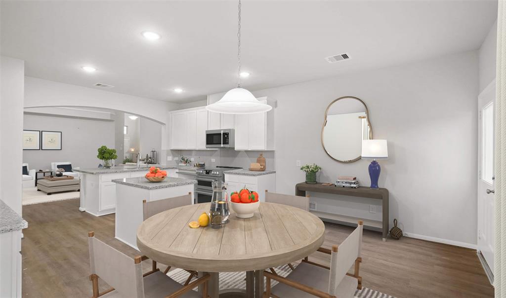 View of kitchen and dining area (*Photo not of actual home and used for illustration purposes only.)