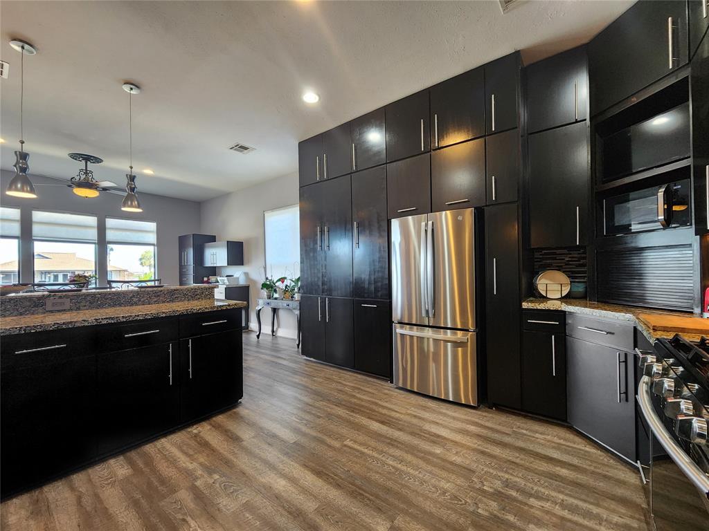 View of the dining area from the kitchen.  Notice the additional storage.