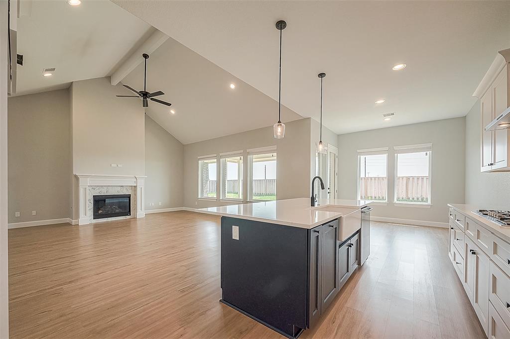 From Kitchen with Apron Sink looking into Family Room