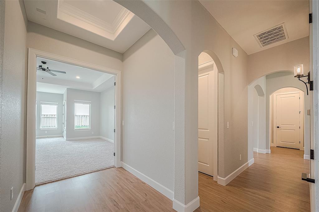 Double Door Entrance into Primary Bedroom