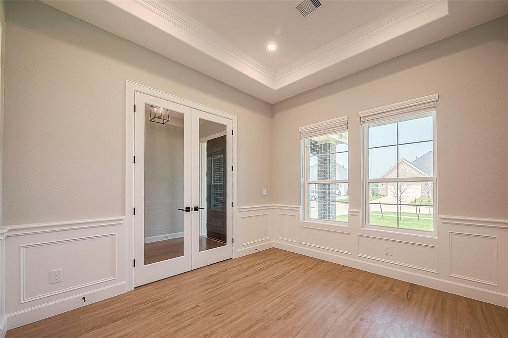 Study with Wainscotting Tray Ceiling with Closet