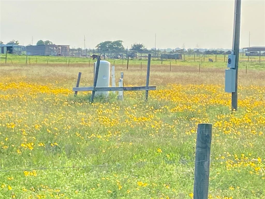 Water well and electric pole