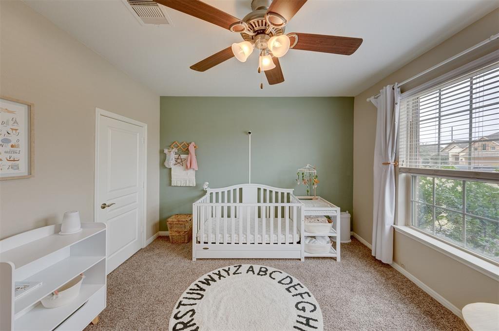 The second bedroom is on the ground floor in the front of the home.