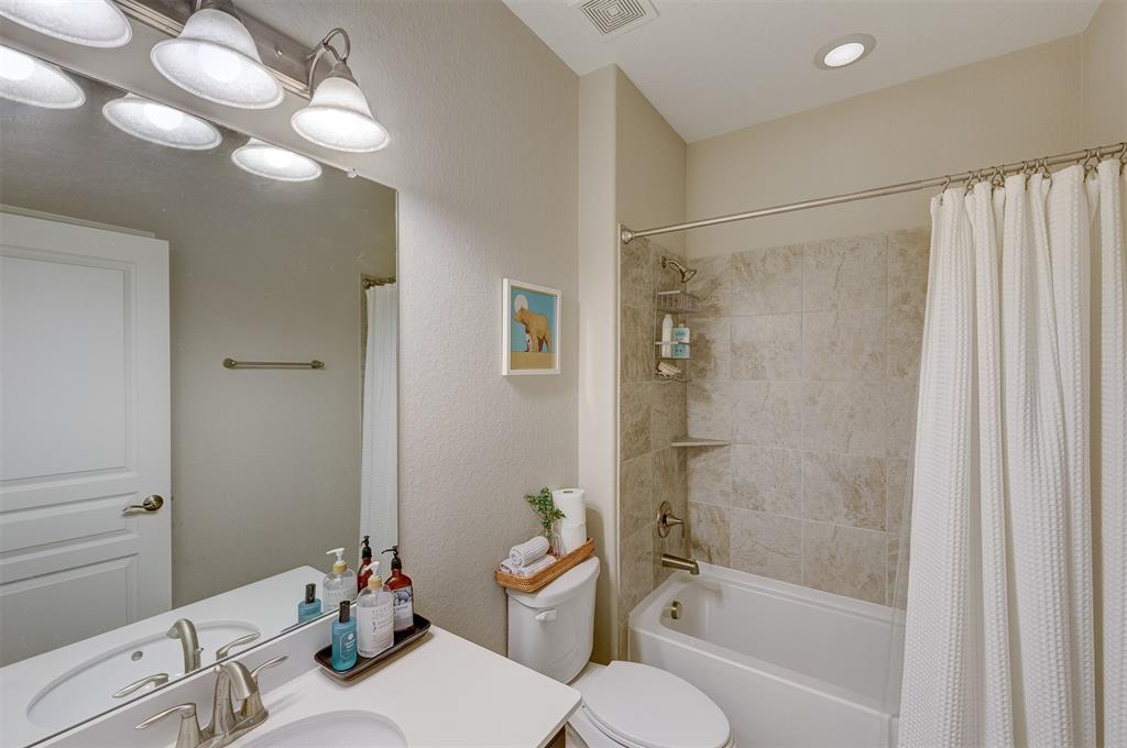 This nice full bath is adjacent to the ground floor guest bedroom.