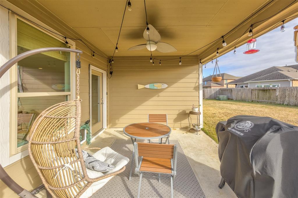 The covered patio makes a super place for relaxing or entertaining.