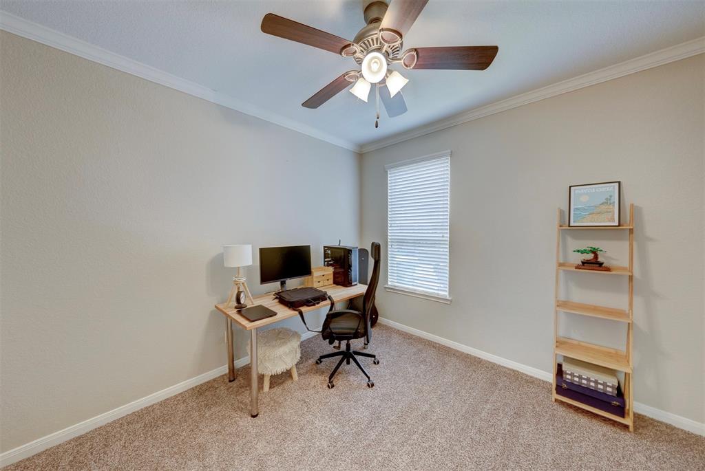 The quiet study has French doors to the hallway.