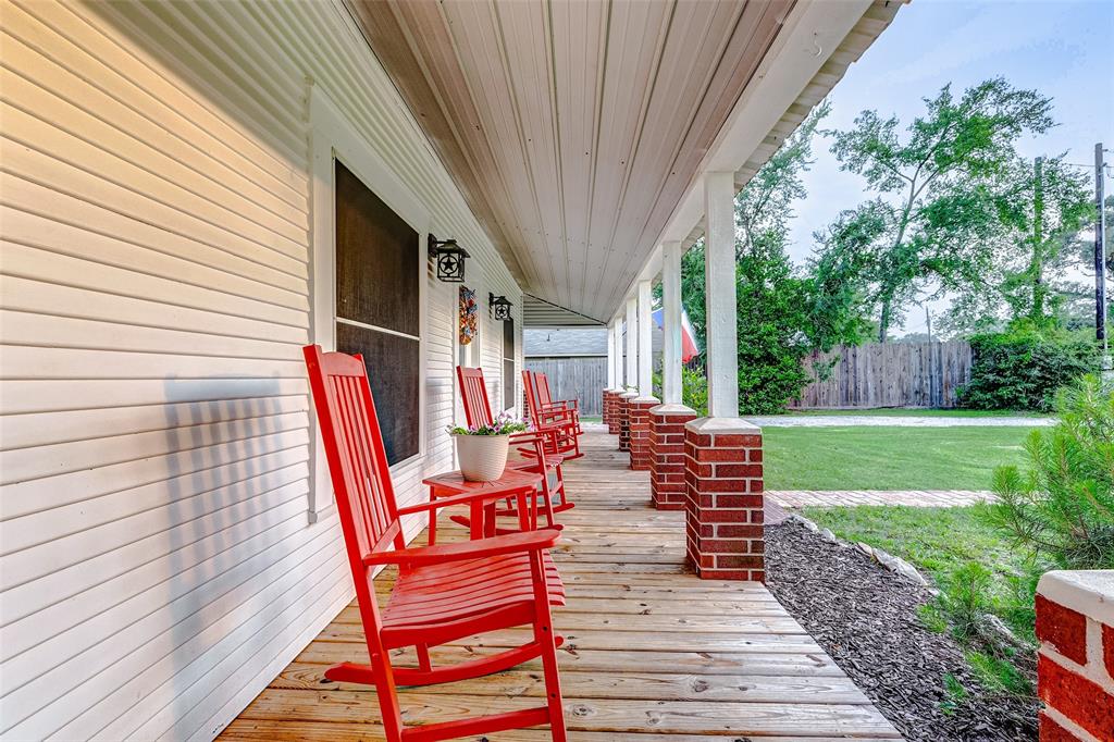 Rock your worries away on the inviting wraparound porch of this countryside gem.