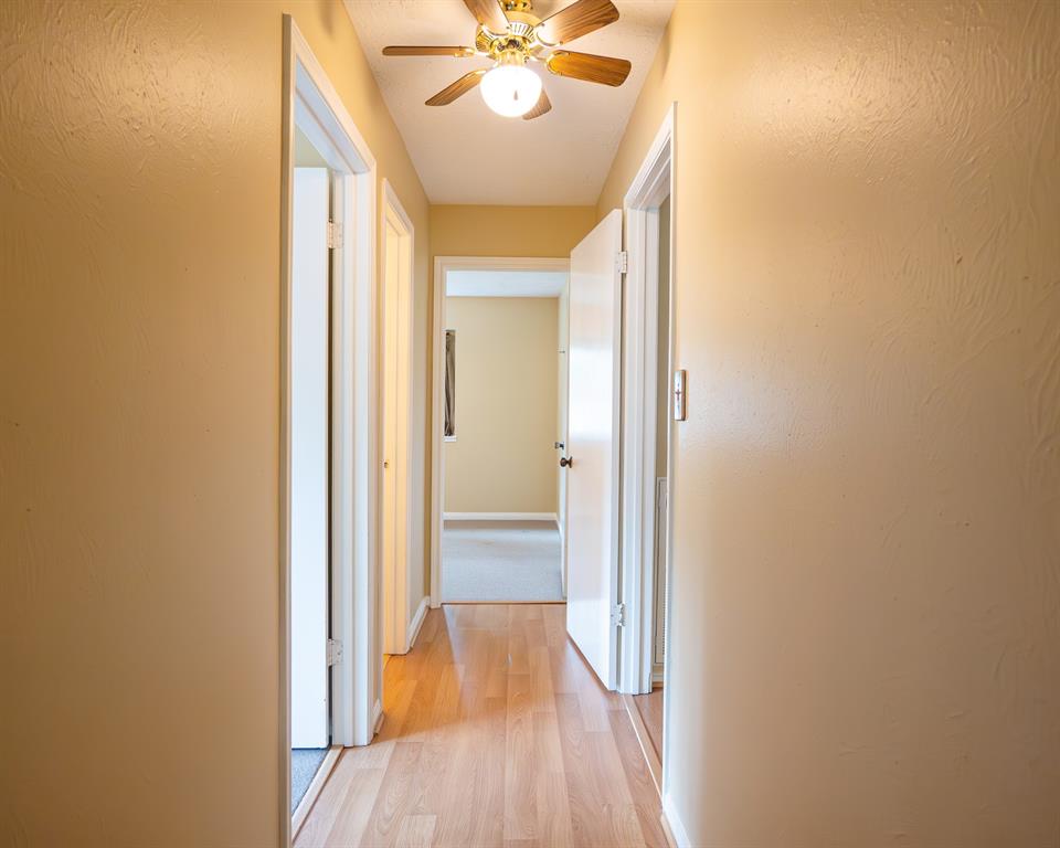 Hallway leading to bedrooms and bathrooms