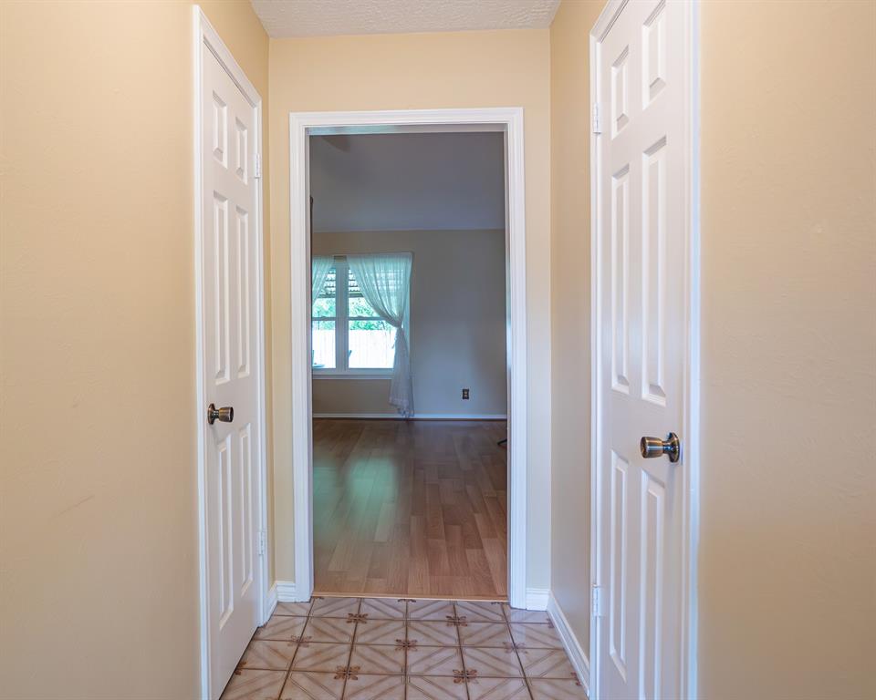 Beautiful tile entryway with 2 closets for extra storage