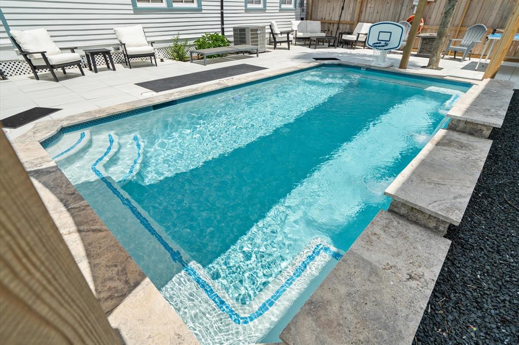 Look at the fabulous seating around this heated pool!