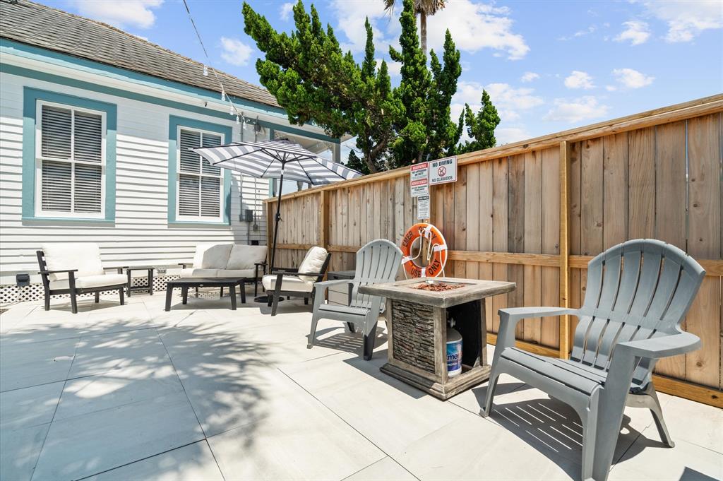 Look at this wonderful seating area for sunning or chilling at the firepit!