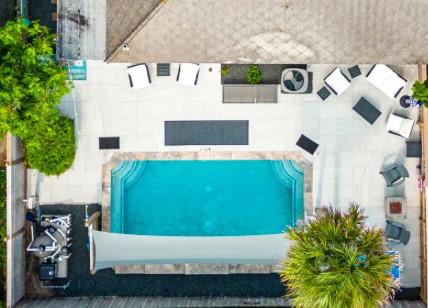 This decked out patio has expensive poly-wood black and white furnishings, games like ping pong etc. You will never want to leave!