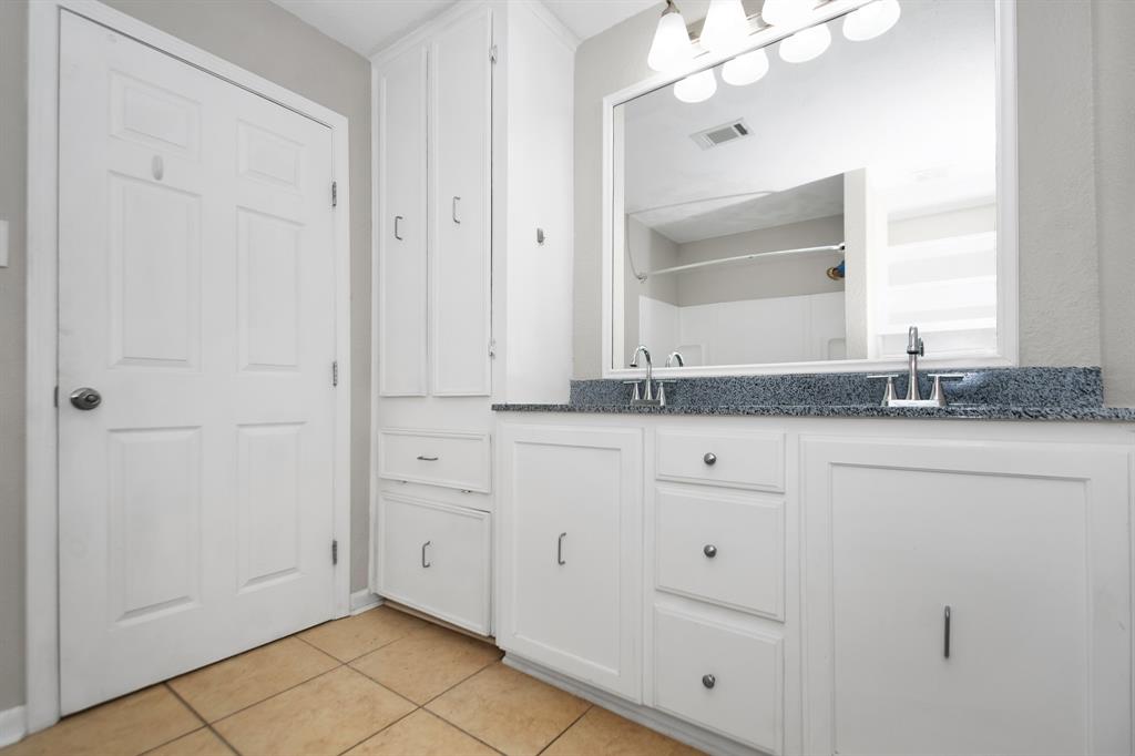 Refinished bathroom with fresh paint job.