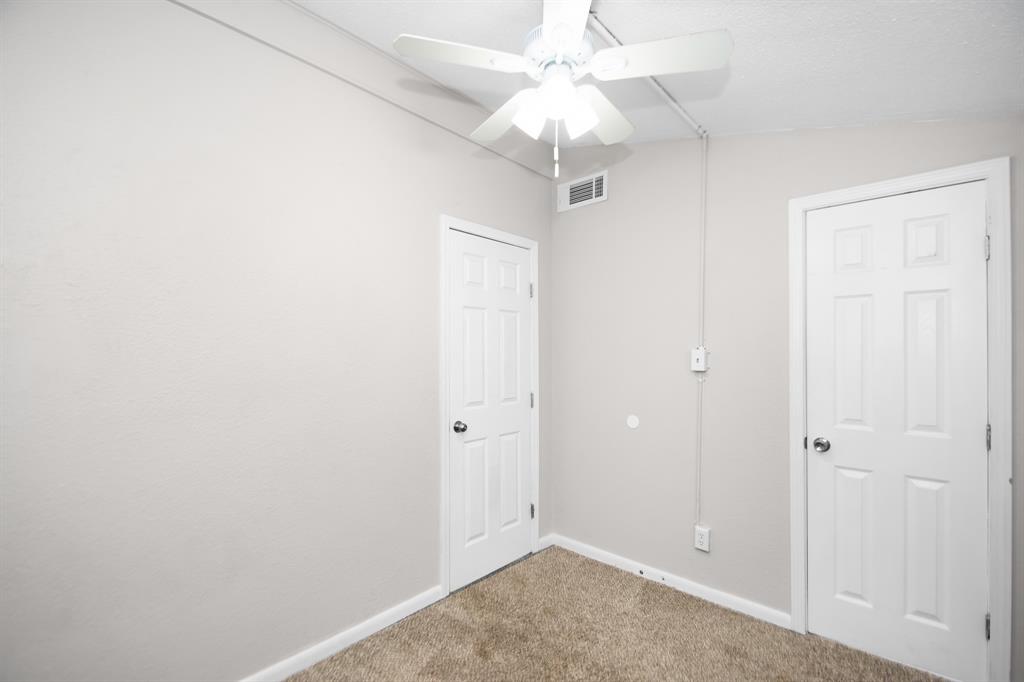 3rd secondary bedroom located near the kitchen.