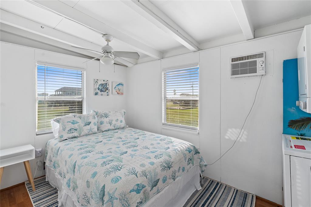 PRIMARY BEDROOM WITH TWO LARGE WINDOWS THAT ALLOW TONS OF NATURAL LIGHT.