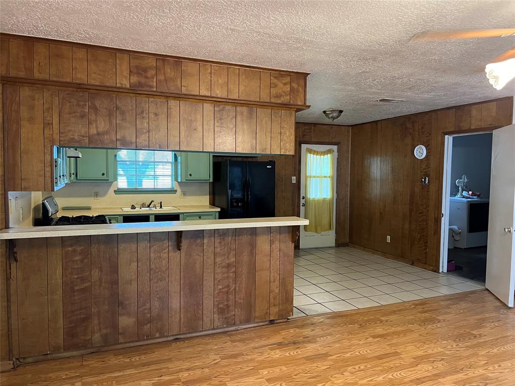 Cooking can be fun when you can join in with the family. Living room to Kitchen Dining Room area.