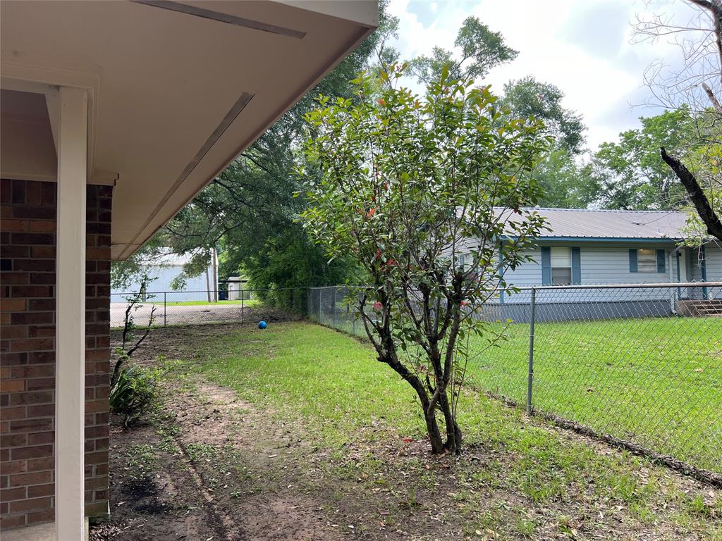 This is the side yard to the right of the Home