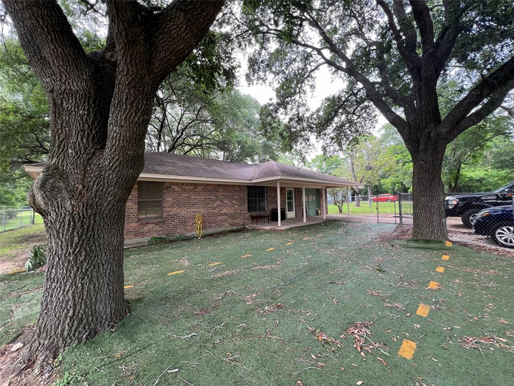 Front Yard with Oak Trees. Grass does not grow under these Lovely Oak Trees that Provide Plenty of shad.