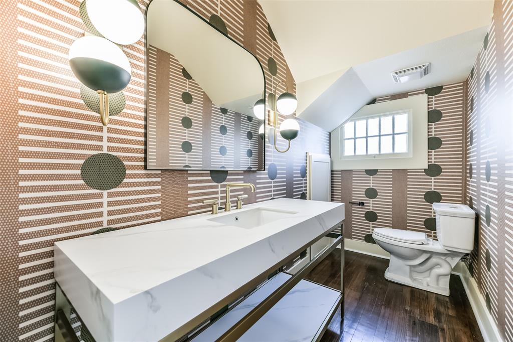 Half bath on the first floor off the kitchen/dining room area.