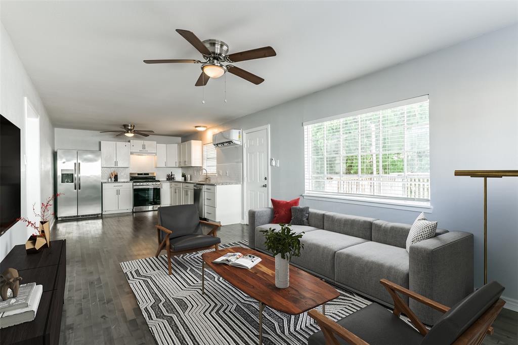 Virtually staged living area in garage apartment.