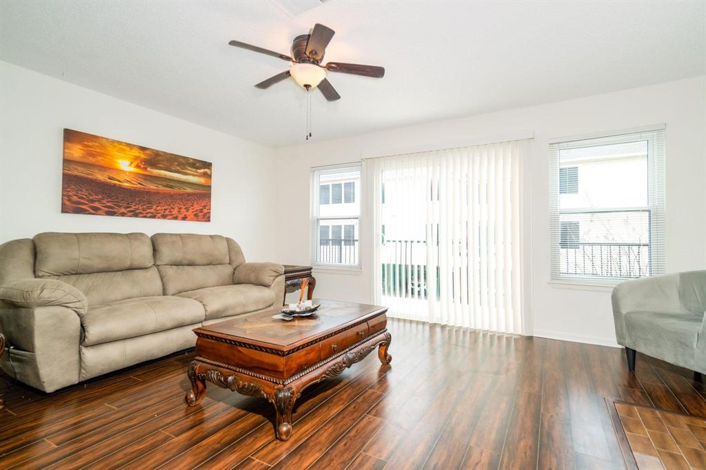 Formal living room with balcony.