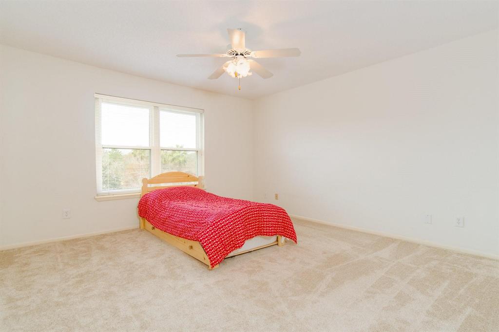 Large Primary bedroom number 2. Both bedrooms have ample space with storage.