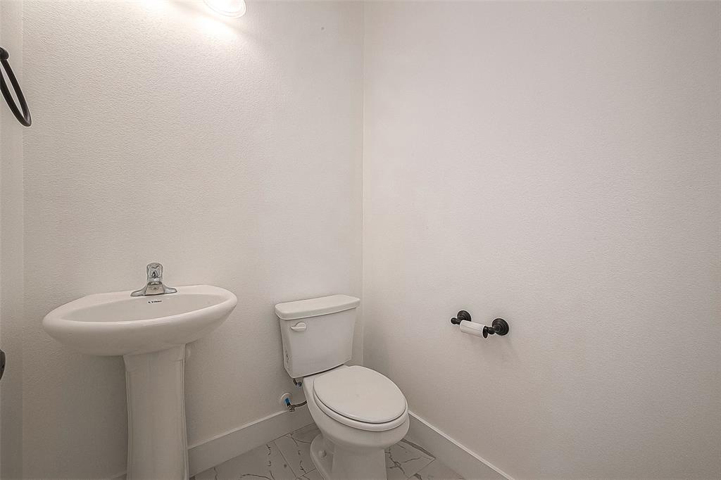 The half bathroom is conveniently located in the first floor.