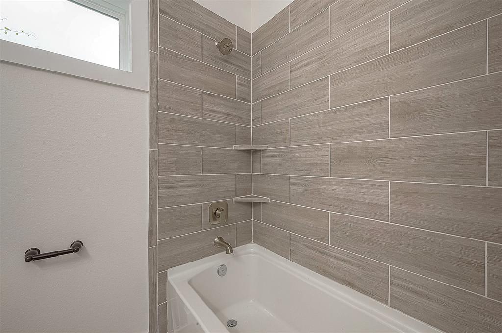 Convenient secondary bathroom combines functionality and style, ensuring comfortable private area for personal care.