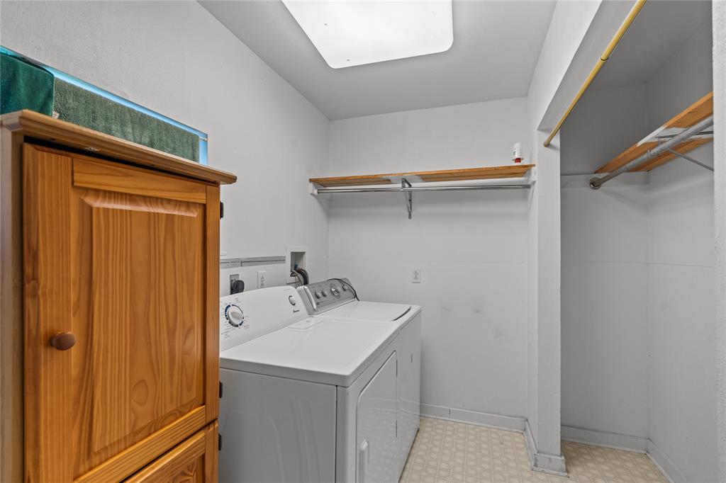 Utility room with washer dryer to convey.