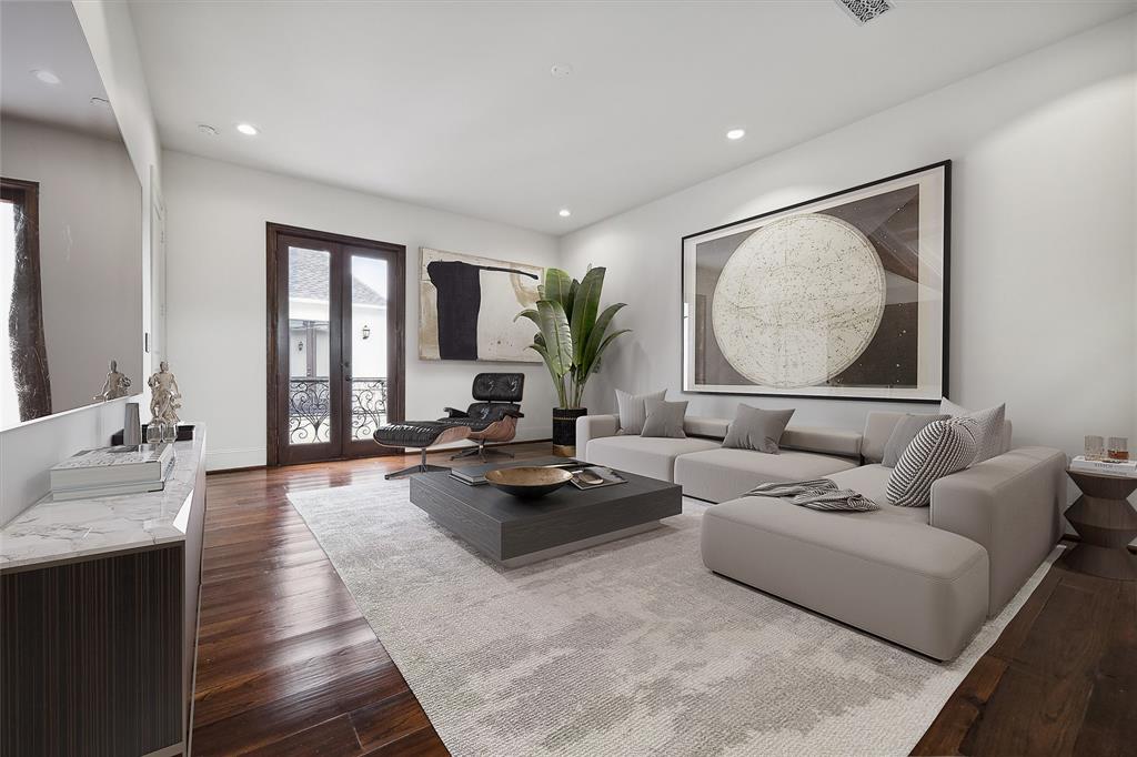 Upstairs media room overlooking courtyard (Digitally staged image).