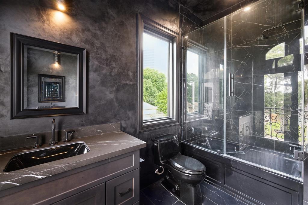 A full bathroom serves bedrooms 2 and 3 with continued custom details.