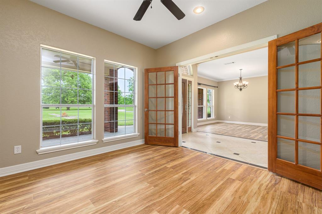 Study/home office located just off the foyer. Perfect for those who work from home. The amount of living space in this home is truly unbelievable. 2 inch blinds have been added.