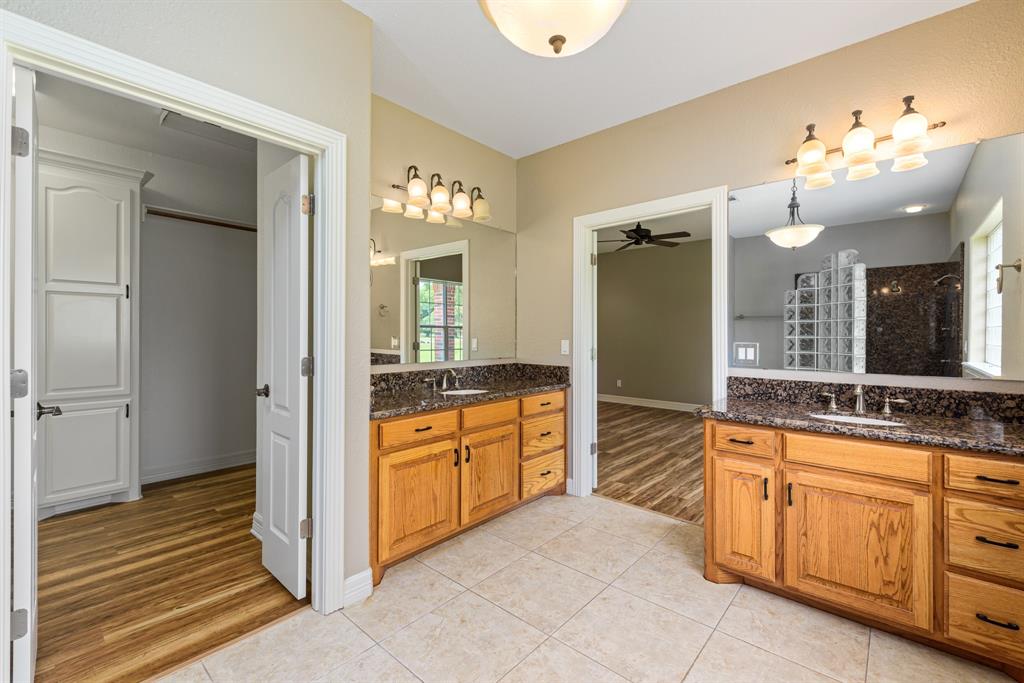 Double sinks and separate dressing areas and a spacious closet to accommodate all of your wardrobe needs.