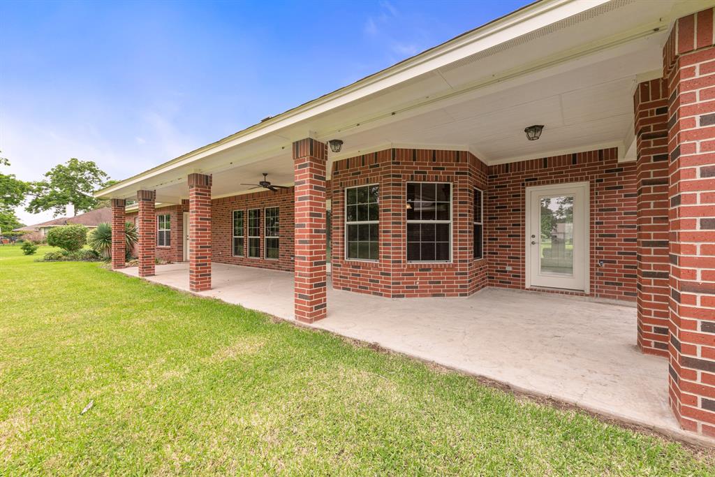 The expansive back covered patio is the perfect place to dine alfresco. The extended outdoor living space is large enough to accommodate multiple seating and dining areas to host large gatherings.