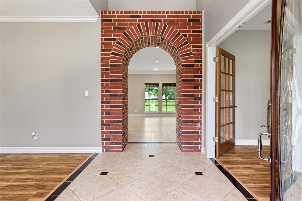 Welcome to your gorgeous new home! Beautiful neutral color palette, arched doorways,solid surface floors and designer upgrades throughout. You will love this fabulous home!