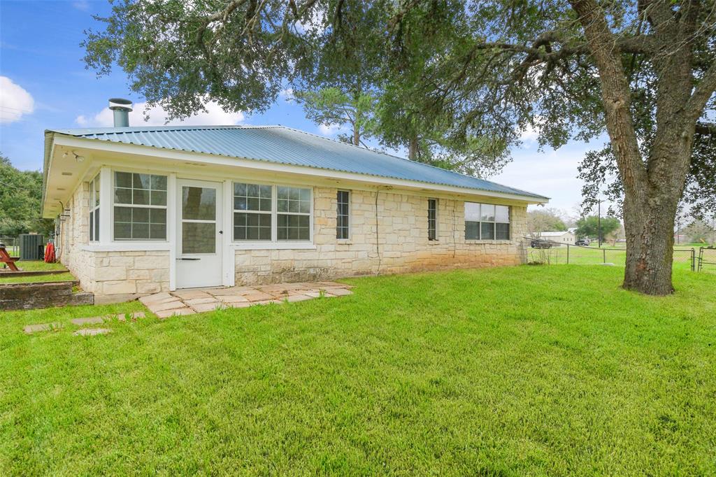 An enclosed porch leading you to your outdoor oasis!