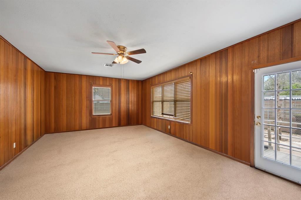 Second large living area with a large closet could serve as a home office or fourth bedroom if needed.