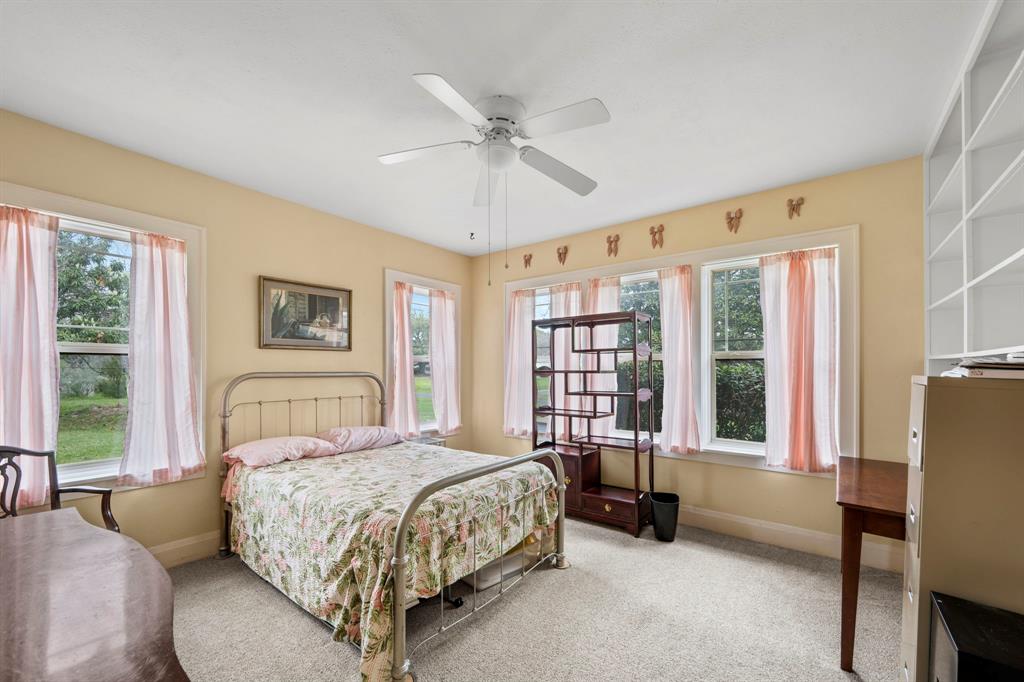 Third bedroom features built in bookshelves.