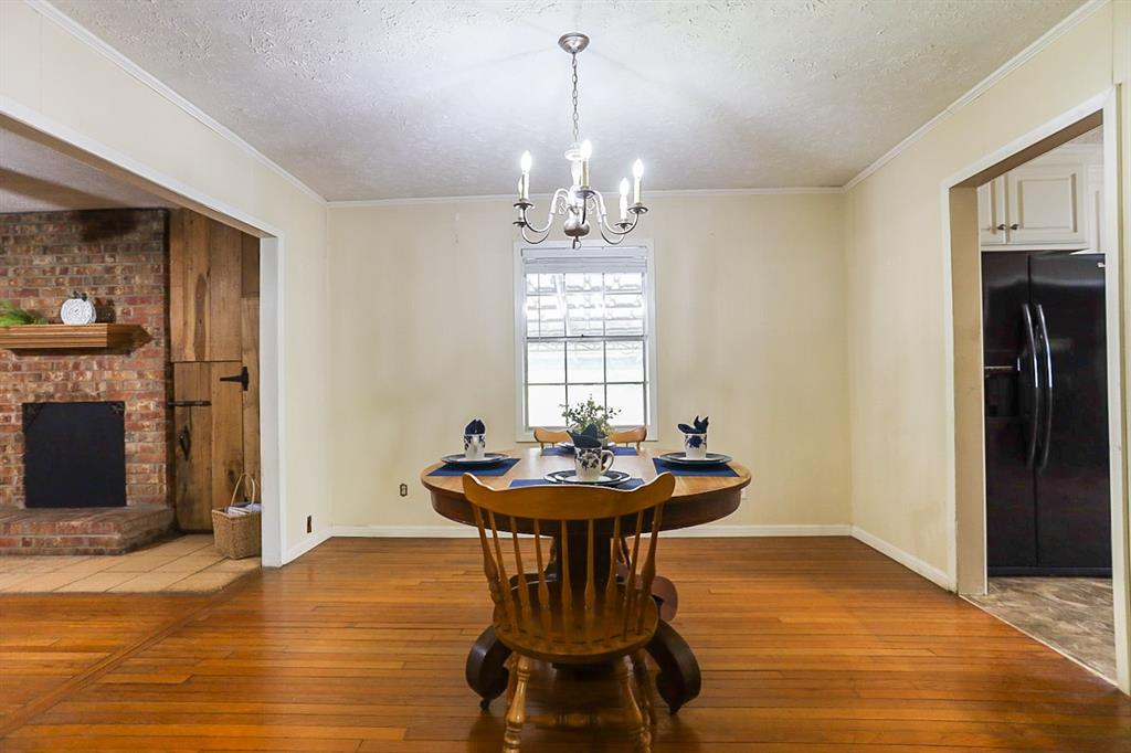 Dining room open to kitchen and view of lake.