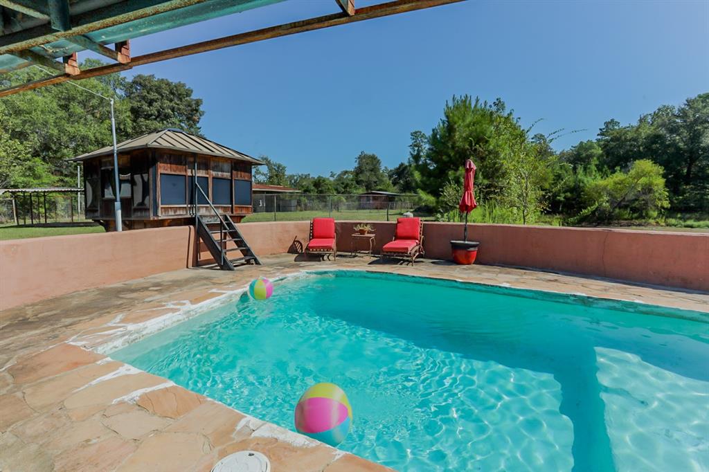 Swimming pool and hot tub with cabana