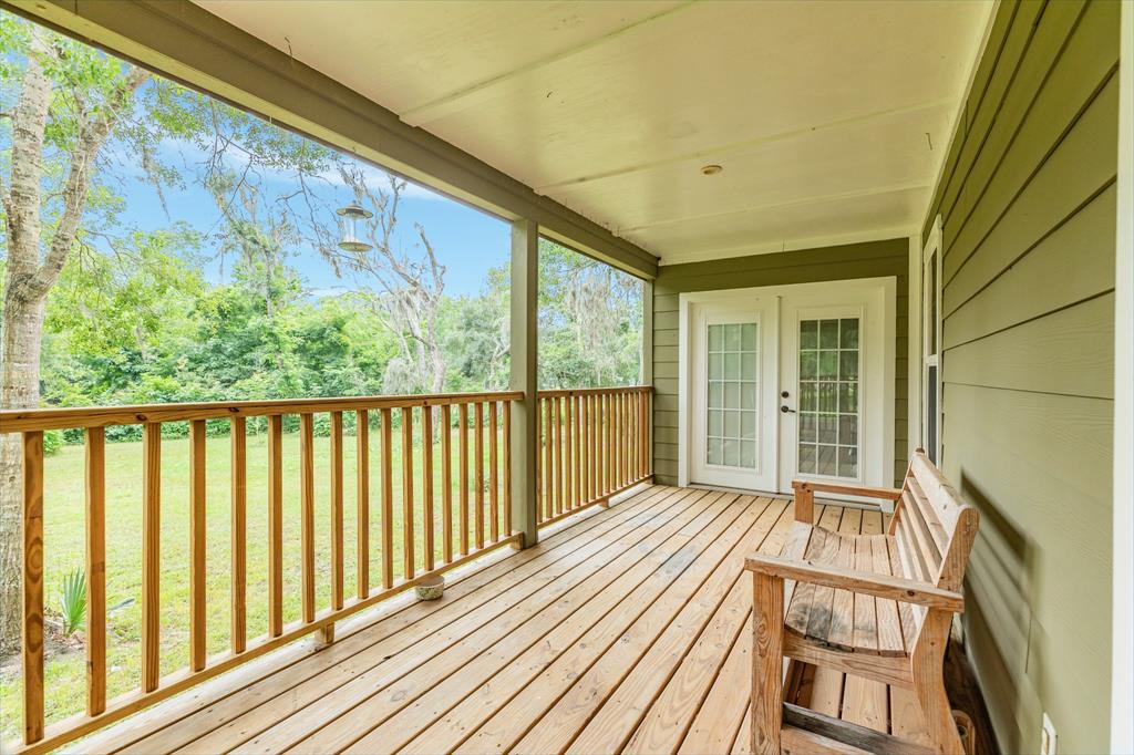 Private porch off of primary bedroom