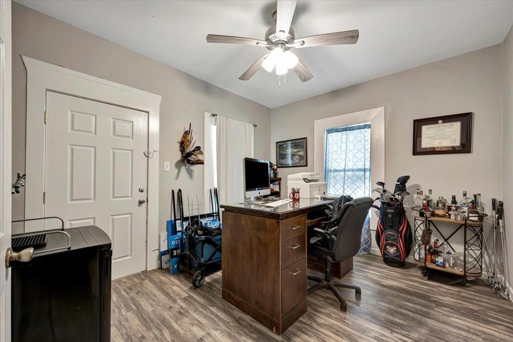 This is the front bedroom currently being used as a study.