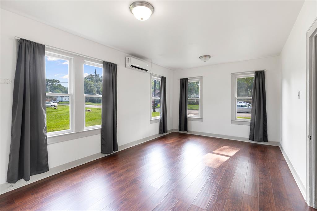 Check out that natural light. This room is oversized & offers plenty of space to create an additional reading nook.