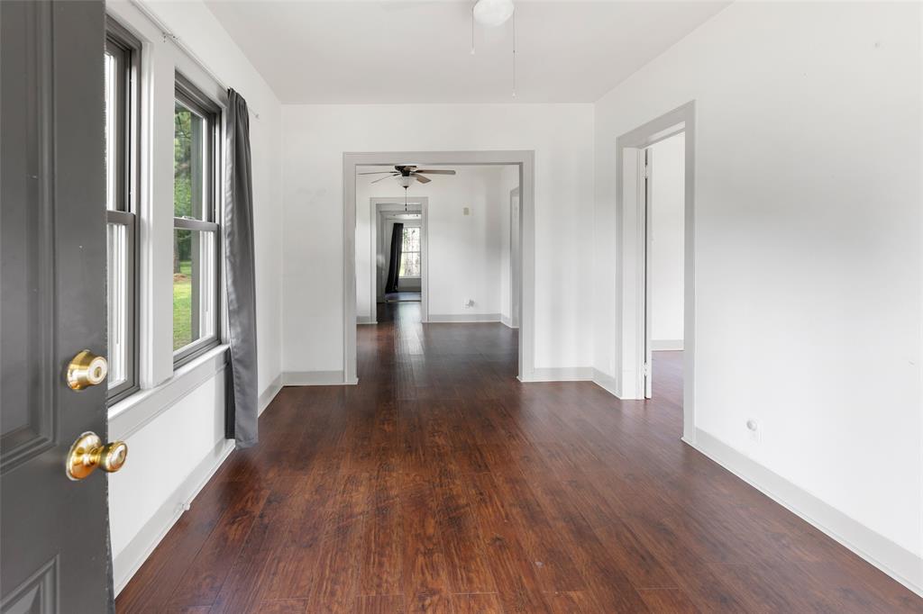 Front door opens to double living space.