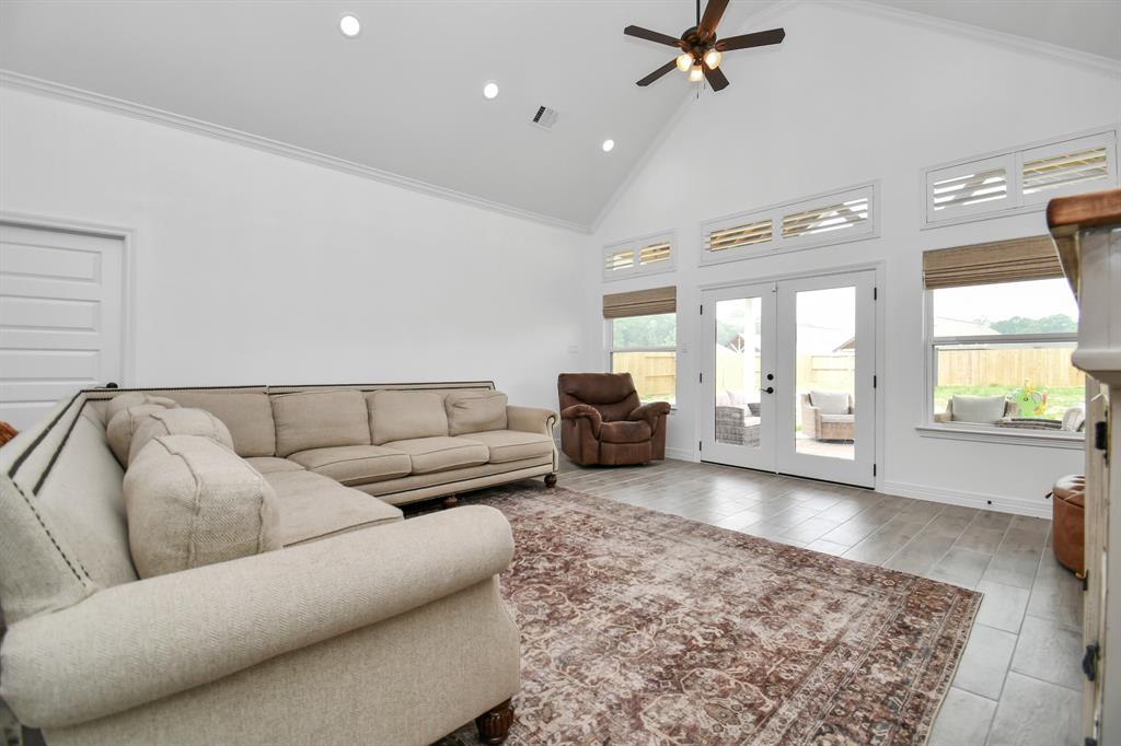 Living room with 15ft vaulted ceilings