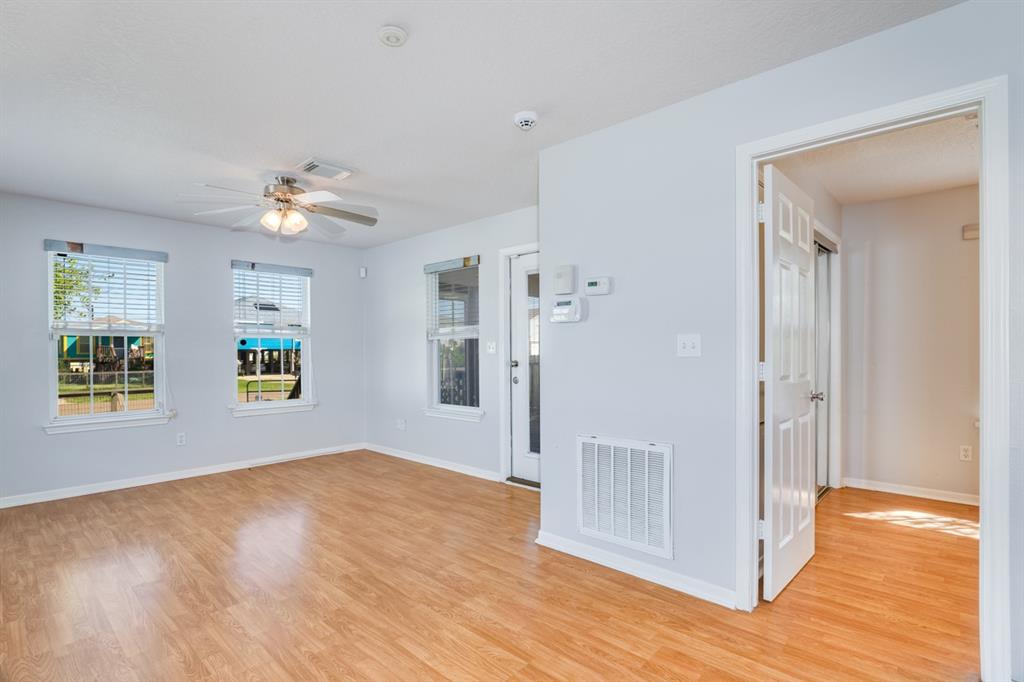 view of family room along with French doors to secondary bedroom.