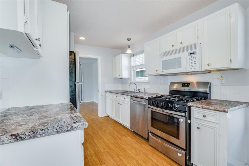 Stainless appliances in the kitchen.