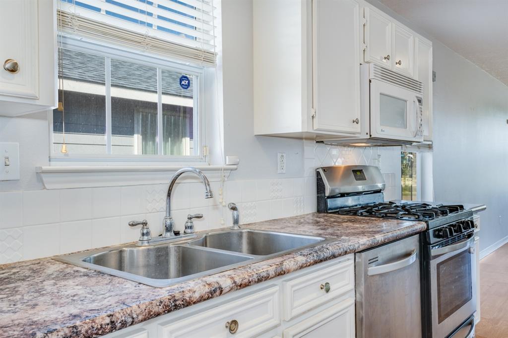 light and bright in the kitchen area along with granite counter tops.