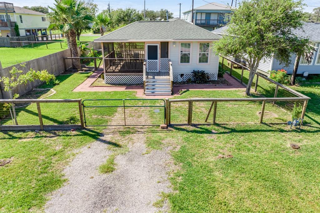 An elevated aerial view of the front of the home.