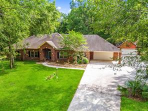 302 Lago Trace Dr, Huffman, TX 77336